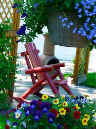 Red Chair Red Rocker Red Rocking Chair Blue Flowers Lattice Pansies Colorful Colorful Garden Chimi Colorful Garden Creative Gardening Red Rocking Chair