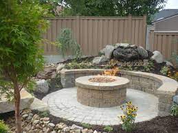 40 Circular Fire Pit Seating Area Ideas Round Patio Designs In 2021 Fire Pit Landscaping Backyard Patio Fire Pit Patio