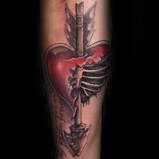 Guy With Arrow Rib Cage Broken Heart Tattoo Design On Inner Forearm Style Shopping Styl Broken Heart Tattoo Broken Heart Tattoo Designs Heart Tattoo Designs