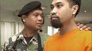 Manila jailbreak embarrassment for Arroyo