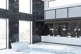 Check spelling or type a new query. Luxury Bathroom Corner In Hotel With Black Marble Walls White Marble Floor White Bathtub And Four Sinks Standing On White Counters 3d Rendering Stock Photo Picture And Royalty Free Image Image 122314331