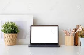 The most common office desk plant material is stretched canvas. Workspace Office Desk With Laptop Computer Plant And Pencil Pot Stock Photo Picture And Royalty Free Image Image 107848430