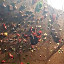 He used his powers to help others. Spiderman Climbing A Bouldering Wall Spiderman