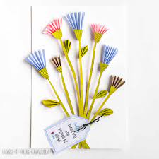 Add a pin to the back for wearing; Recycled Paper Flower Bouquet Hello Wonderful
