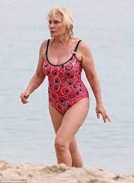 Debbie Harry 68 Rocks A Pink Geometric Swimsuit Blondie Debbie Harry Debbie Harry Deborah Harry Blondie