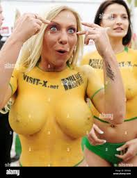 Erotic actors of the team Blue Movie All Stars walk onto the field  prior to a nude soccer game Sexy Soccer 2010 in Berlin, Germany, 12  June 2010. The players of Visit-X