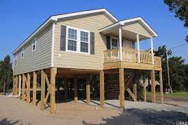 Our narrow lot house plans are designed for those lots 50' wide and narrower. Narrow Lot Modular Homes Down East Realty Custom Homes