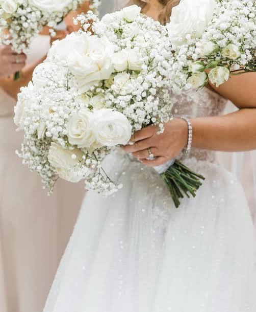 Classic Elegance: White Roses and Baby's Breath Wedding Florals
