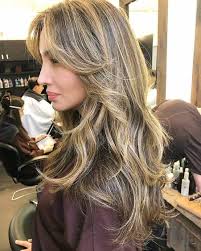 And the hair color is…brown with blonde highlights, also known as bronde. 22 Lustrous Sandy And Mousy Brown Hairstyles To Copy