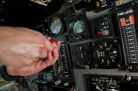Aircraft maintenance engineers installing avionics or transponder systems.