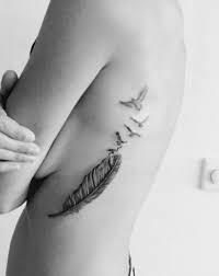 Bird Tattoo On Ribs Feather Tattoo On Body Feather Bird Tattoo Ribs Feather With Birds Tattoo Bird Tattoo Ribs