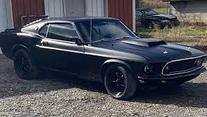 All Black 1969 Ford Mustang Mach 1 Looks Like a Spawn from Hell, Goes for  $45K - autoevolution