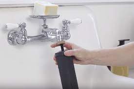 Press the priming button up against the sink faucet so that the priming button creates a seal between the faucet and the fluoride filter. How To Prime Berkey Water Filters Farmhouse On Boone