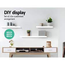 The shelves are made of wood and are very much in function and very beautiful. 3 Piece Floating Wall Shelves Asterix Store