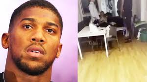 MUST SEE! ANTHONY JOSHUA STORMS STUDENT FLAT AND THREATENS 'TO CRACK THEIR  GLASS JAWS'
