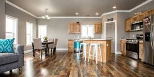 This Brand New Affordable Kalispell Home Features An Open Floor Plan With 3 Bedrooms 2 Bathrooms Beautiful Floors Common Area Home Home Decor