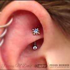 185 Likes 6 Comments Perry M Doig Bvla Perrymdoig On Instagram New Rook Piercing Featuring A White Gold An Arctic Cz Jewel By Rook Jewelry