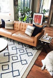 Leather Sofa Inspiration Happy Interior Blog Mid Century Living Room Mid Century Living Layered Rugs