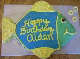 Fishing pond cake with pretty blue water. Fun And Easy Cake Ideas Directions For An Ocean Themed Party Delishably