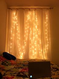Diy Headboard Christmas Tree Lights A Mounted Curtain Rod And Curtains Hanging Over The He Decorating With Christmas Lights Beach Themed Room Studio Living