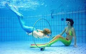 mermaids underwater in a swimming pool pool swimming pools pool float