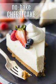This No Bake Vanilla Cheesecake Is Topped With Your Favorite Fruits And A Drizzle O In 2021 Cheesecake Recipes Easy Homemade Easy Cheesecake Recipes Cheesecake Recipes