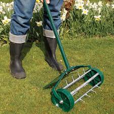 You can add a handle from an old lawn mower or something similar to make pushing it through the yard simple. How To Aerate A Lawn By Hand Lawn Care Blog Lawn Love