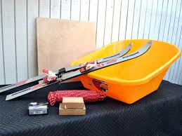 We recently had several inches of snow in southern england, and as usual, everything ground to a halt. How To Build A Sled From A Pair Of Old Skis And A Wheelbarrow Diy