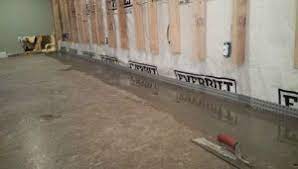 A french drain, also called a curtain drain, is made by placing a perforated pipe in a trench that has been filled with gravel. French Drain Basement Lifeguard Basement Waterproofing