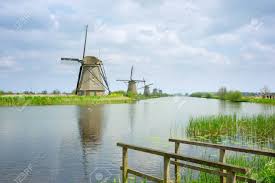 The bank of holland app provides secure access to your accounts allowing you to manage your finances from virtually anywhere. Dutch Windmills On River Bank Kinderdijk Holland Stock Photo Picture And Royalty Free Image Image 25973874