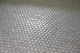 Black penny tiles are a chic and trendy thing for every bathroom, from masculine to industrial. Gray Penny Round Flooring Beautiful Penny Tiles Bathroom Penny Tile Floors Grey Penny Tile