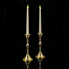 Fishbowls are another way to increase the impact of simple glass votives. Mr Light Candles Battery Taper Candles Pair Of Tall Ivory Led Timer Tapers Two Real Brass Candlesticks