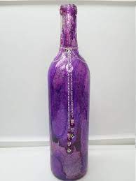 In this video, i will show you how to create a beautiful miniature alcohol bottle bouquet with things that you can buy from the dollar store! Fairytale Shimmering Purple Alcohol Ink Bottle Art Home Wine Bottle Centerpieces Alcohol Ink Glass Bottle Art