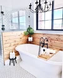 The bathroom has practical brushed concrete floors. Farmhouse Bathroom Ideas Board And Batten Siding Blog Modern Farmhouse Bathroom Home Remodeling Home