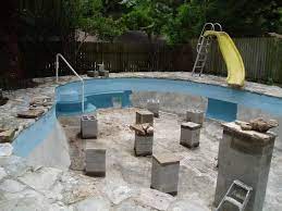 I could see a few koi making it out of a pond on the bluff and swimming downstream to those little falls/pools in the video here? Convert The Swimming Pool To A Koi Pond With Side View And Garden Picnic Area Koi Pond Pond Pond Water Features