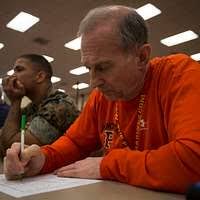 Missie Dollar reacts to Sgt. Luis Ramos, a drill instructor