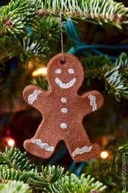 It features a red ribbon with red and white striped trim, and little embroidered gingerbread men all along the ribbon! Gingerbread Man Christmas Ornaments Simple Joy