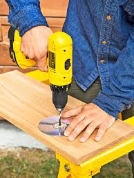 Handheld drills can be used to drill holes through wood. 3 Tips For Drilling Super Straight Holes