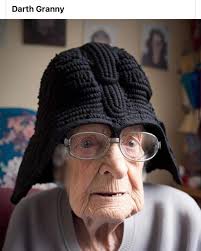 My friends daughter wearing her Darth Vader Helmet...