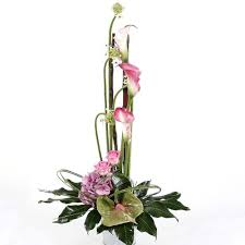 Bloomex has been offering affordable fresh flower and gift hamper deliveries in brisbane, queensland since 2011. Tall Floral Arrangement With An Oriental Flair Tall Flower Arrangements Contemporary Flower Arrangements White Flower Arrangements