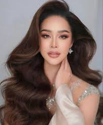 Hi! I'm Asian and I'm interested in a Thai-inspired look for my wedding  day,specifically, a soft glam makeup style paired with traditional  Thai-inspired hair, similar to the photo below. I'm looking for