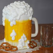 The couple of cats in love celebrate a birthday in the restaurant. Beer Mug Cake Decorating Photos