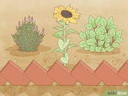 Cover your soil with a blanket of organic material such as straw, leaves, shredded paper or cardboard, or bark. 3 Simple Ways To Maintain A Garden Wikihow