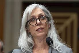 Photo of mother and baby's rescue becomes symbol of storm