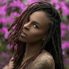 Longer dreadlocks are challenging to style because the hair is heaver and it is a little more difficult to keep the hair in an updo. Black Women With Dreadlocks Hairstyles Best African American Dreadlock Styles
