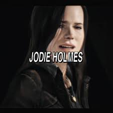Jodie Holmes Gives in