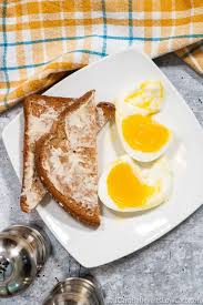 Once the water is boiling, reduce the heat to low and use skimmer to gently and slowly add the eggs to the water. Perfect Soft Boiled Eggs Recipe How To Make Soft Boiled Eggs