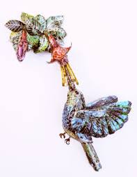 VAL Hunt of ArtHunt a creative recycling artist Touring Exhibitions showing  Sculptures, Wall Hangings, Jewellery and Hats.