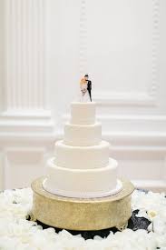 Classic Wedding Cake Idea Four Tier Fondant Frosted Wedding Cake With Traditional Cake Topper Classic Wedding Cake Cool Wedding Cakes Wedding Cake Toppers