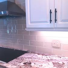 You won't believe how the homeowner turned a dated + brown kitchen into a light + bright it is about the fresh and clean white subway tile backsplash. Cream Glass 4 X 12 Subway Tile Subway Tile Outlet